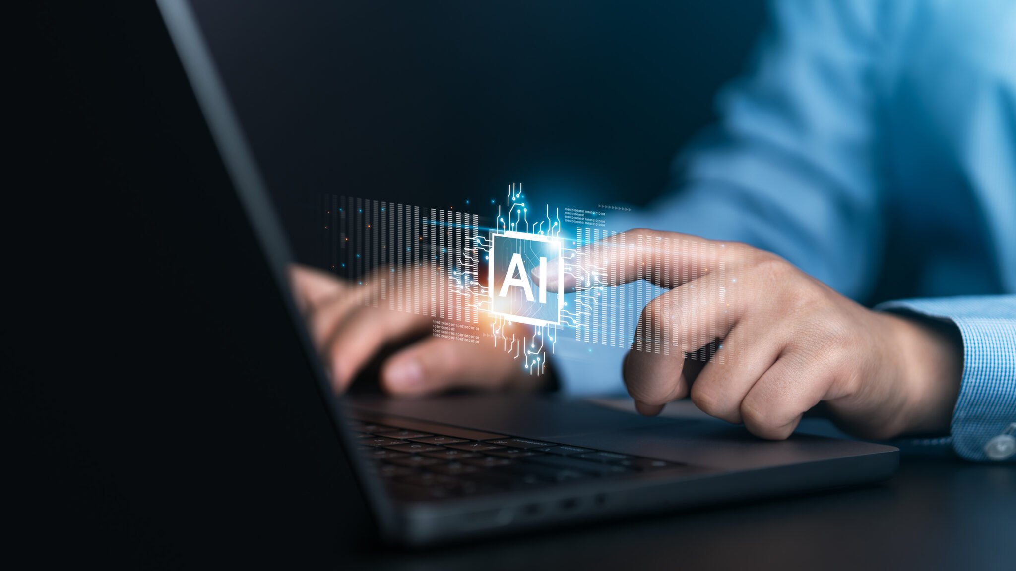 someone on laptop touching AI floating button